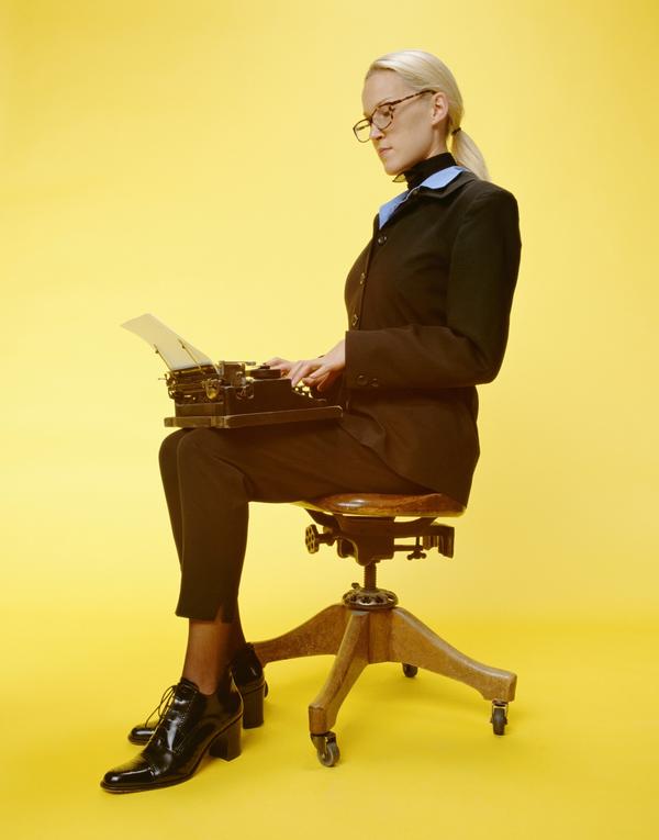 商业女性图片-商业金融图 打字 旋转椅 坐立,商