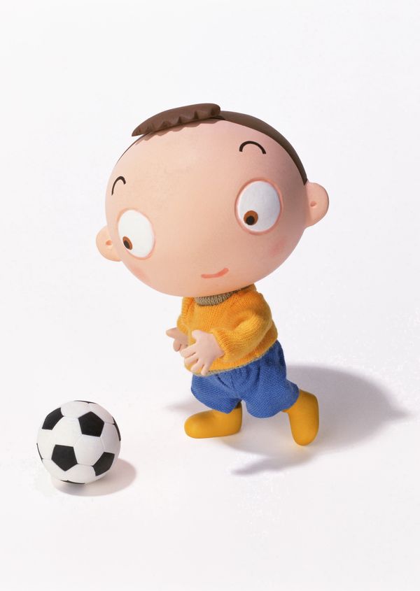 快乐家庭图片-休闲生活图 足球男孩 大眼睛 黄