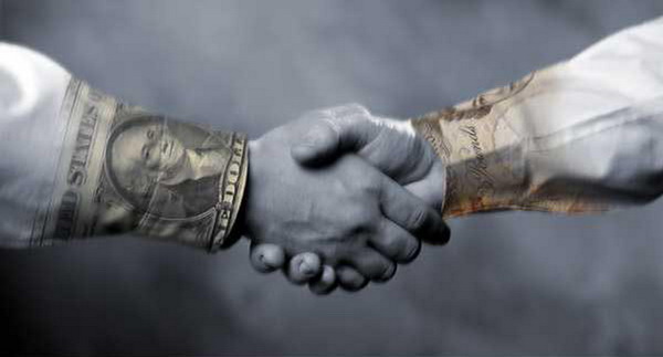 金钱交易图片-金融图 握手 金元外交 利益关系